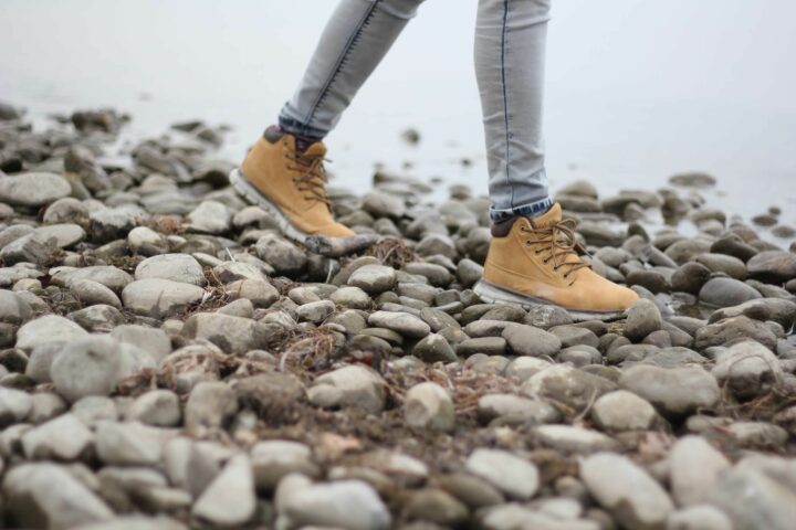 person walking on rocks