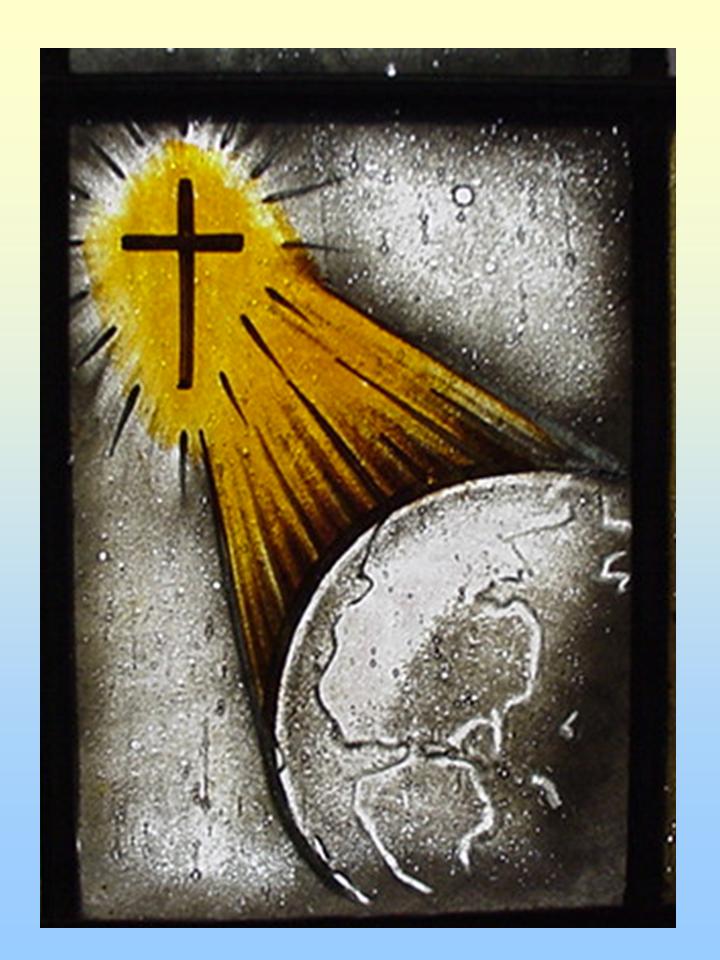 Image of cross with light shining on earth